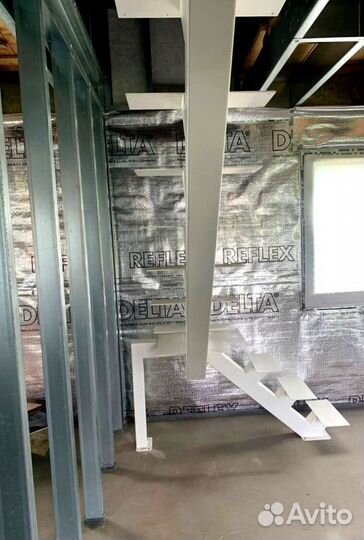 Облицовка лестничного металлокаркаса деревом