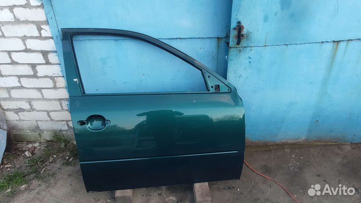 Дверь передняя правая Skoda Octavia Tour