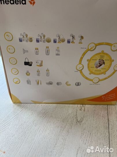 Молокоотсос medela электрический