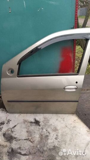 Передние, задние двери, панель приборов Логан 2011