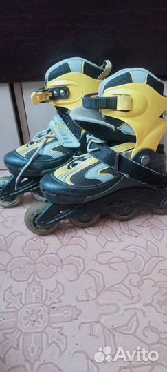 Роликовые коньки