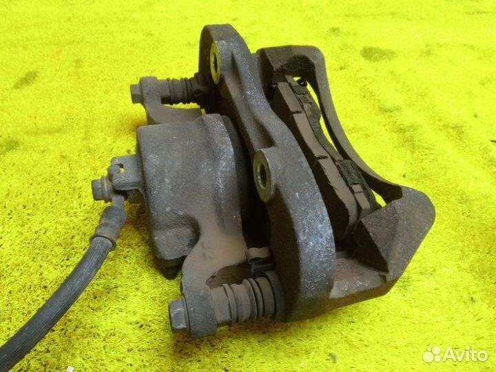 Суппорт передний левый Nissan/Mitsubishi