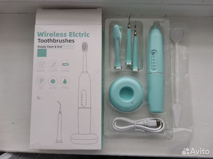 Электрическая зубная щетка новая