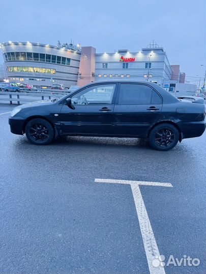 Mitsubishi Lancer 1.6 AT, 2004, 383 524 км