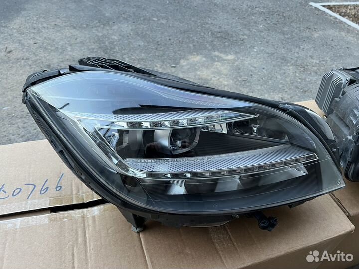 Фара левая CLS W218 три блока