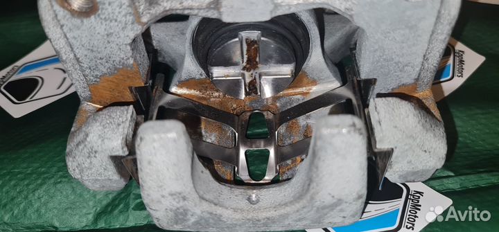 Суппорт тормозной задний левый Honda Civic 4D