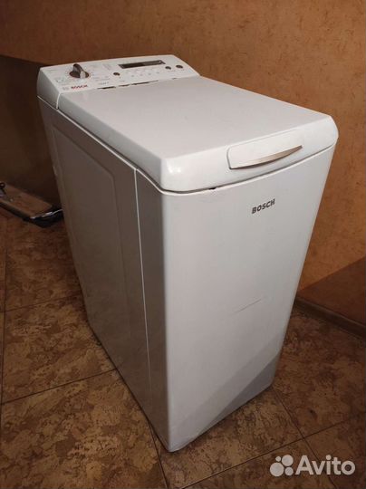 Стиральная машина с вертикальной загрузкой