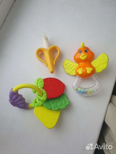 Прорезователи игрушки погремушки