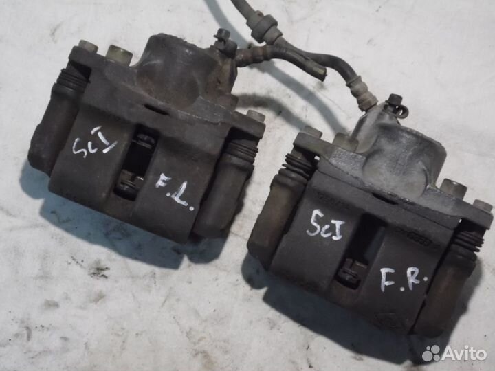 Тормозной суппорт передний Рено Сценик 1