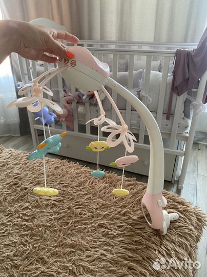 Музыкальная карусель на кроватку