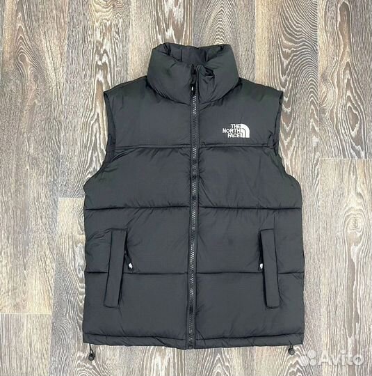 Жилетки The North Face разные цвета