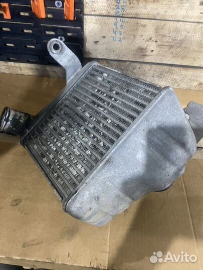 Интеркуллер lancer cedia