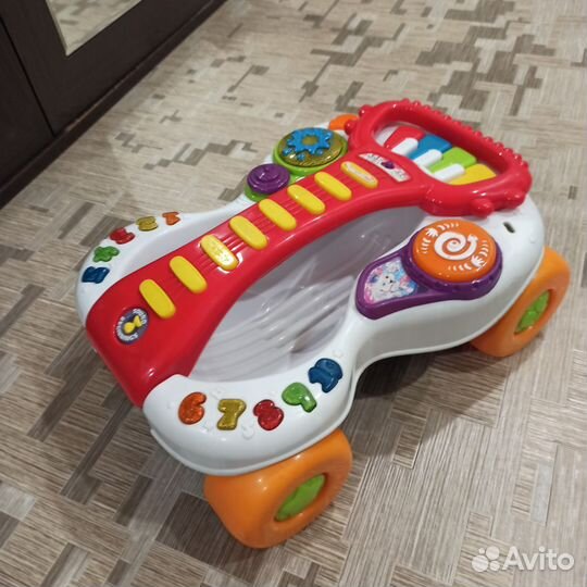 Детская каталка-гитара