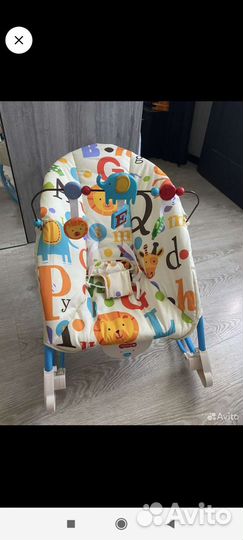 Шезлонг для детей с вибрации