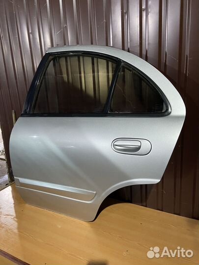 Задняя левая дверь на ниссан альмера классик