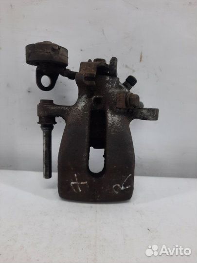 Суппорт тормозной задний правый Opel Zafira A