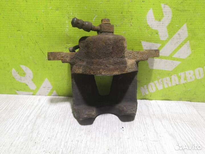 Суппорт передний левый Шевроле Ланос