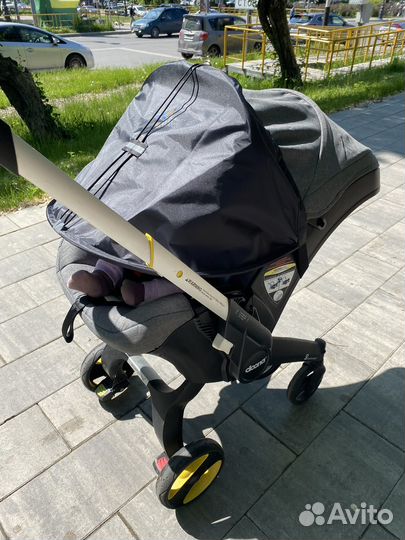 Коляска автокресло Doona с базой isofix