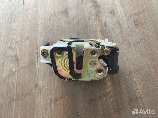 Замок задний левый Mitsubishi Lancer IX 2000-2010