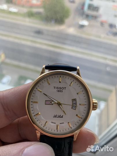 Зодотые часы Tissot