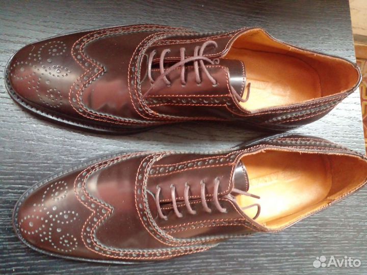 Новые кожаные ботинки