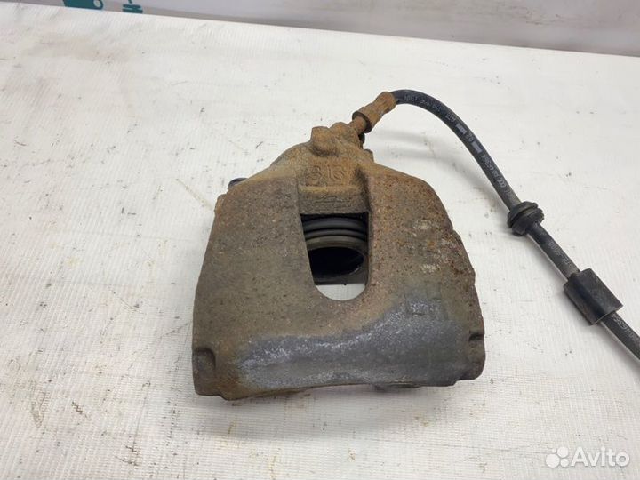 Суппорт тормозной передний левый Ford Focus 2 shda