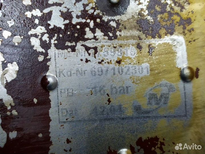 697102301 Радиатор масляный Man TGA