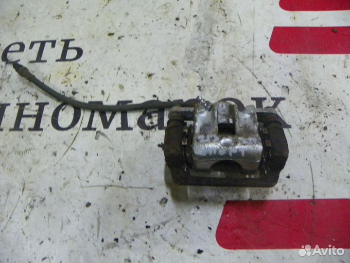 Суппорт тормозной задний правый Kia Sportage