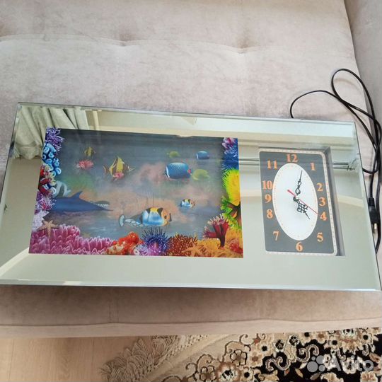 Часы с рыбами