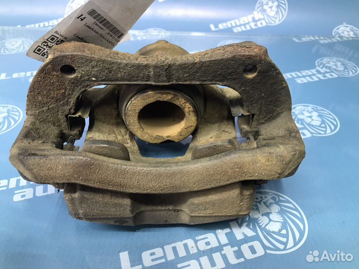 Суппорт тормозной передний левый Chevrolet Aveo