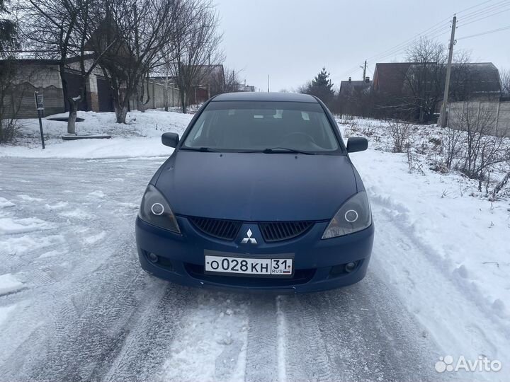 Линзованные фары Lancer 9