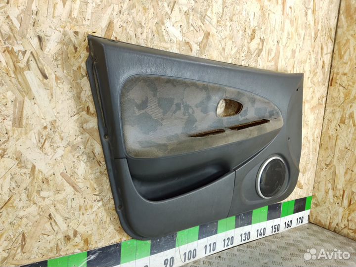 Обшивка двери передней левой Mitsubishi Carisma 20