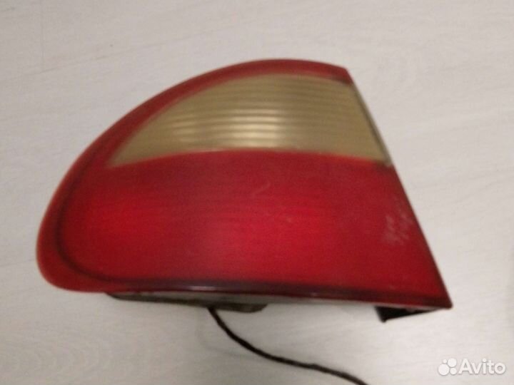 Тормозные колодки и левый фонарь