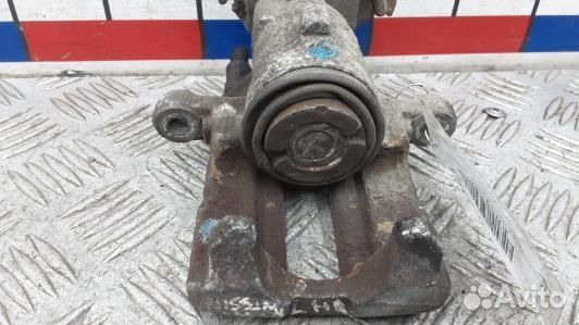 Суппорт тормозной задний левый nissan almera N16