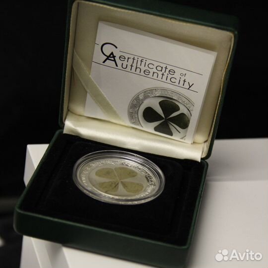 Монета серебро с клевером