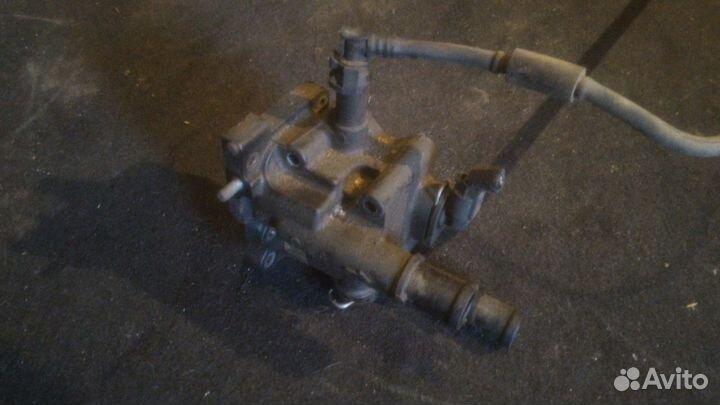 Корпус термостата с трубкой Opel Astra H