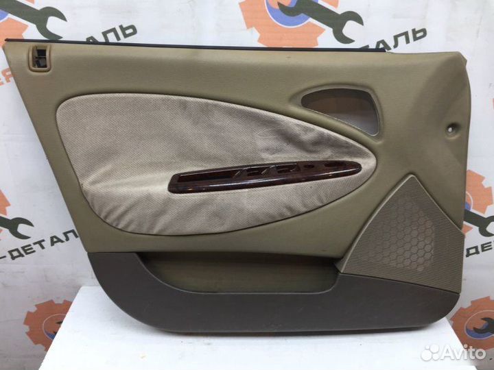 Обшивка двери передняя левая Daewoo Nubira