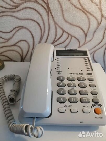 Проводной телефон Panasonic KX-ts2365ruw белый