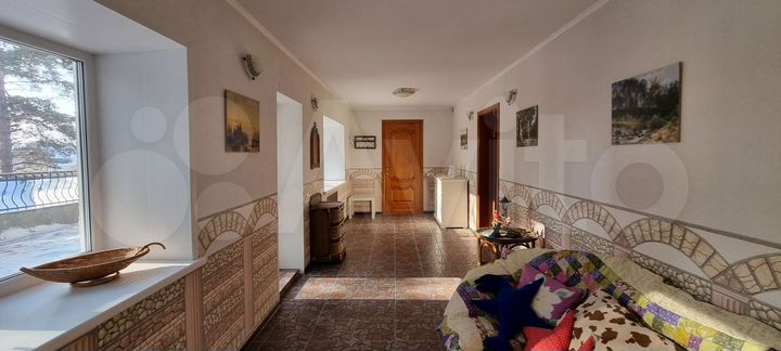 Коттедж 415 м² на участке 12 сот.