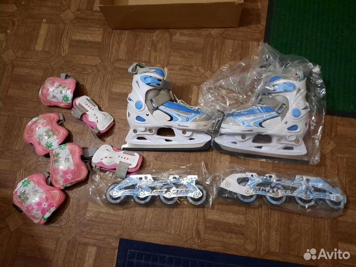 Роликовые коньки