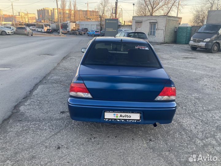 Mitsubishi Lancer 1.6 МТ, 2003, 100 000 км