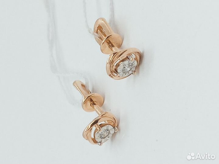 Золотые серьги с камнем