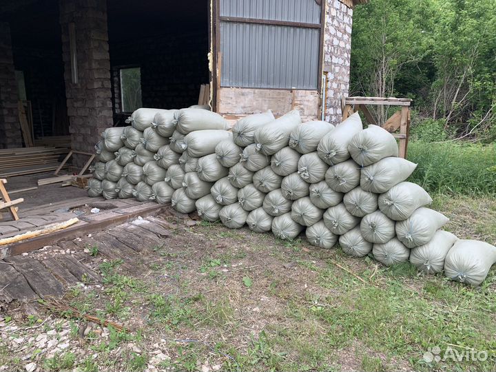 Опилки в мешках