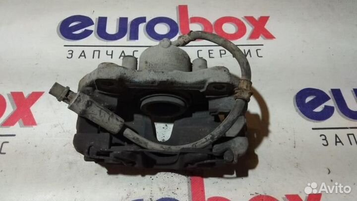 Суппорт передний правый Opel Astra H / Family 200