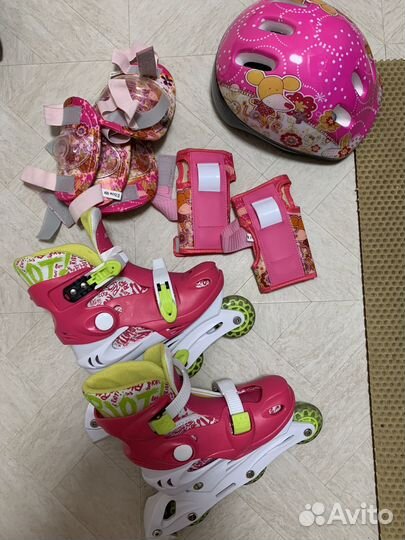 Роликовые коньки