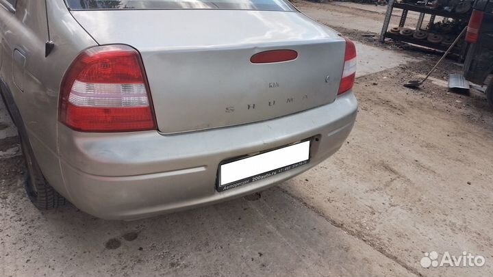 Бампер задний Kia Shuma 1