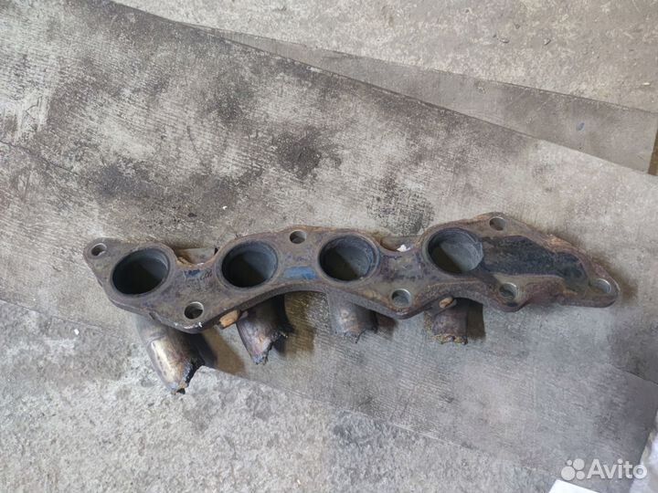 Флянец выпускного коллектора Мазда 2л