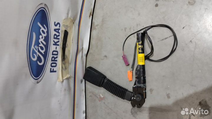 Преднатяжитель ремня безопасности левый Ford Focus