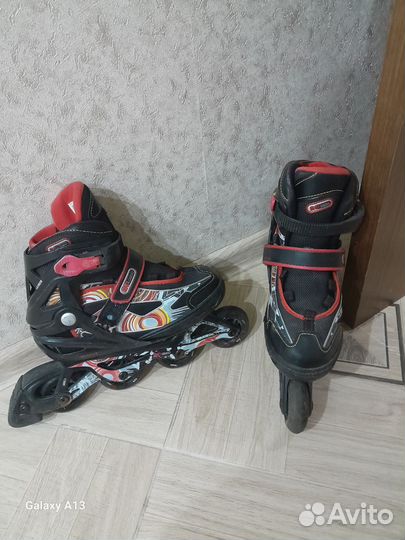 Роликовые коньки