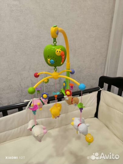 Детская кроватка с продольным маятником